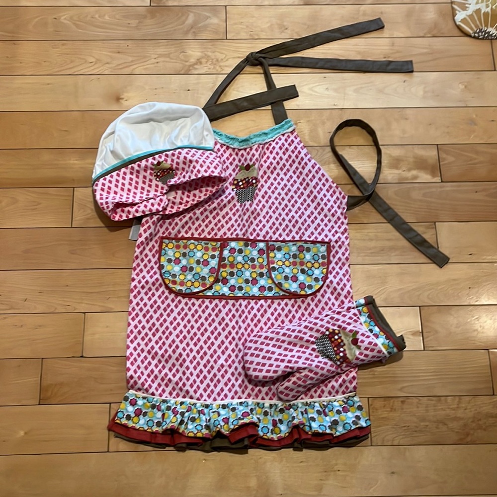 Child’s chef hat, apron and oven mitt